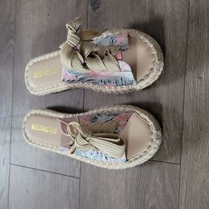 Restricted tropical sandals